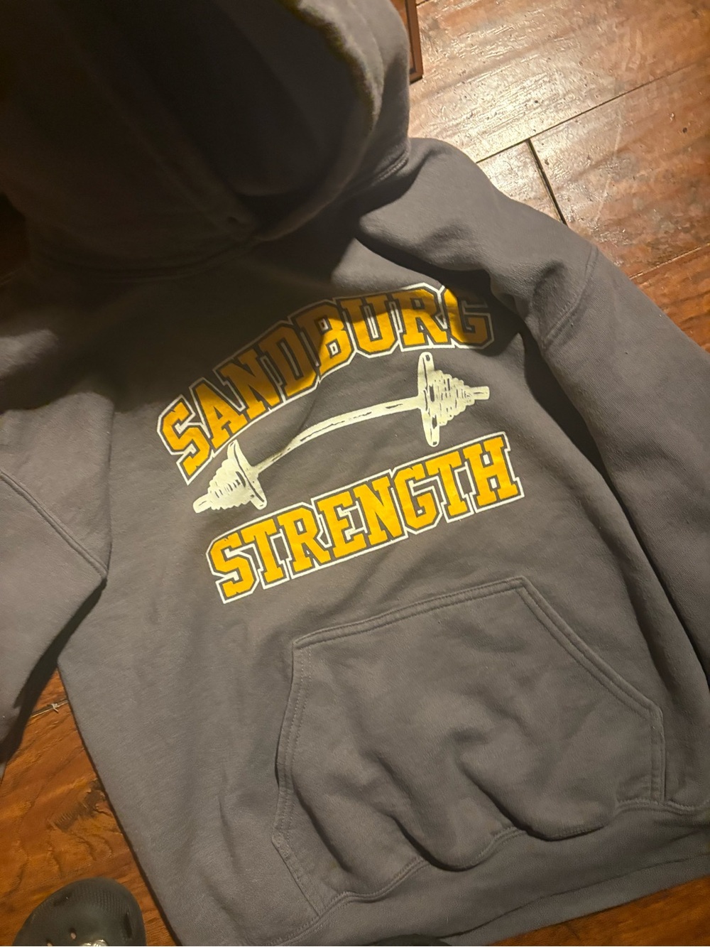 Sandburg Strength Gray Hoodie with Yellow Lettering